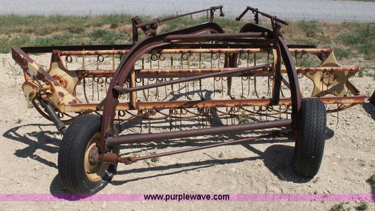 image for item AE9150 New Holland 56 side delivery rake