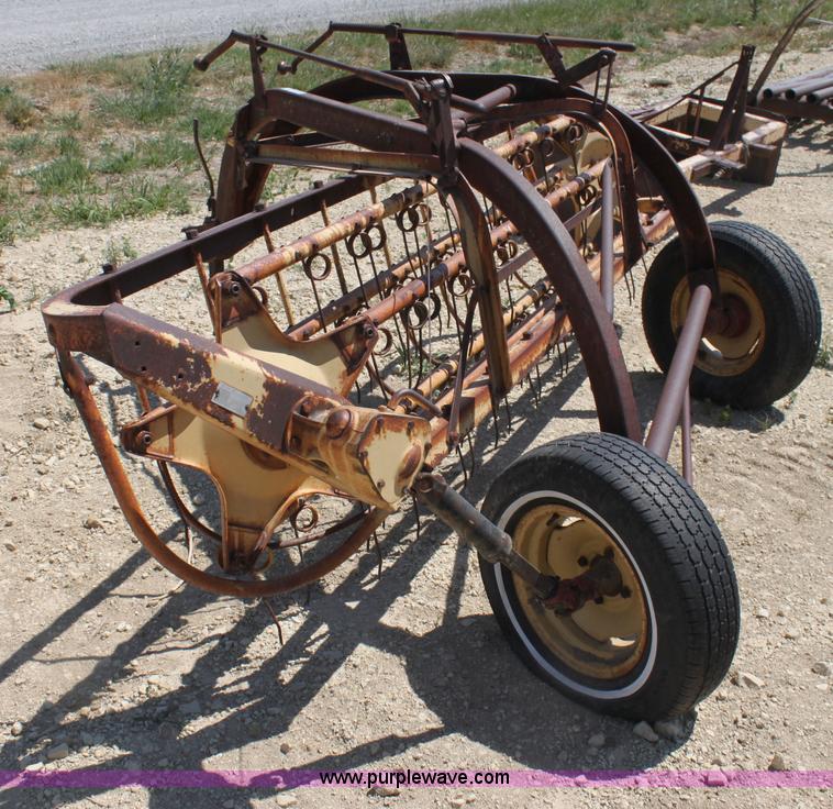 image for item AE9150 New Holland 56 side delivery rake