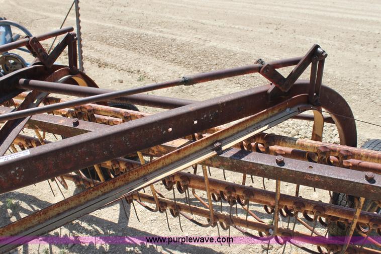 image for item AE9150 New Holland 56 side delivery rake
