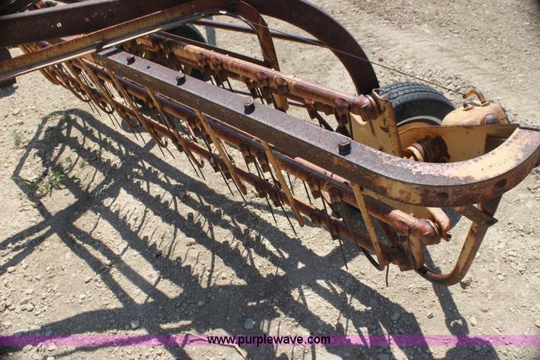 image for item AE9150 New Holland 56 side delivery rake