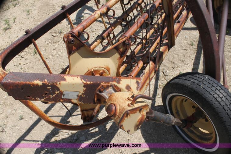 image for item AE9150 New Holland 56 side delivery rake