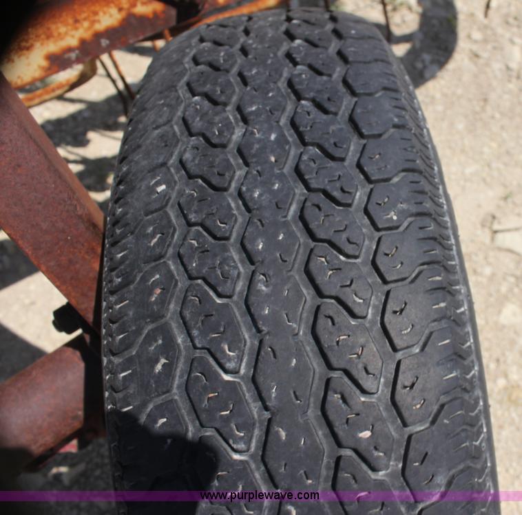 image for item AE9150 New Holland 56 side delivery rake