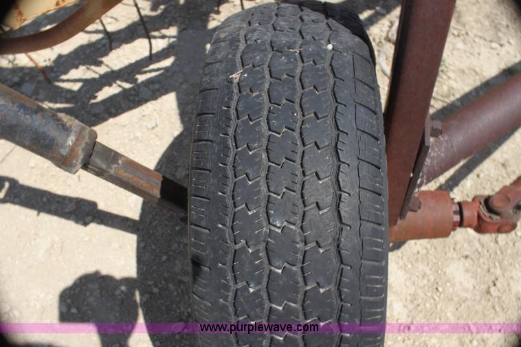 image for item AE9150 New Holland 56 side delivery rake