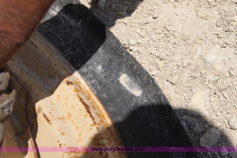 image for item AE9150 New Holland 56 side delivery rake