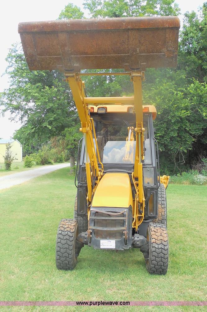 image for item F3225 2005 John Deere 110 TLB tractor loader backhoe