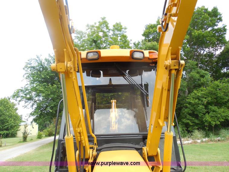 image for item F3225 2005 John Deere 110 TLB tractor loader backhoe