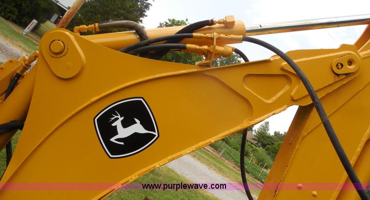 image for item F3225 2005 John Deere 110 TLB tractor loader backhoe