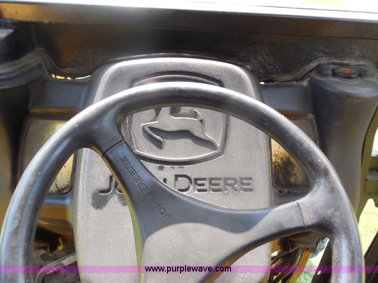 image for item F3225 2005 John Deere 110 TLB tractor loader backhoe