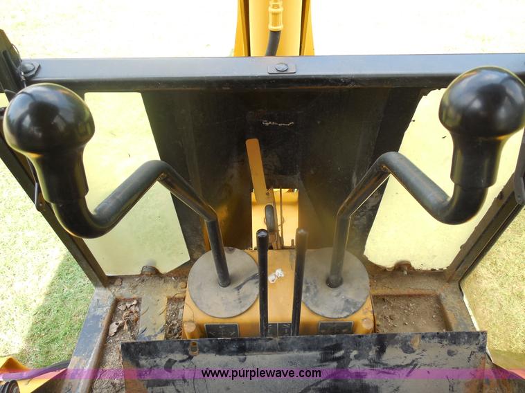 image for item F3225 2005 John Deere 110 TLB tractor loader backhoe