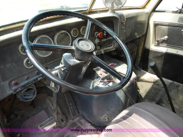 image for item G9479 1984 GMC Brigadier spreader truck