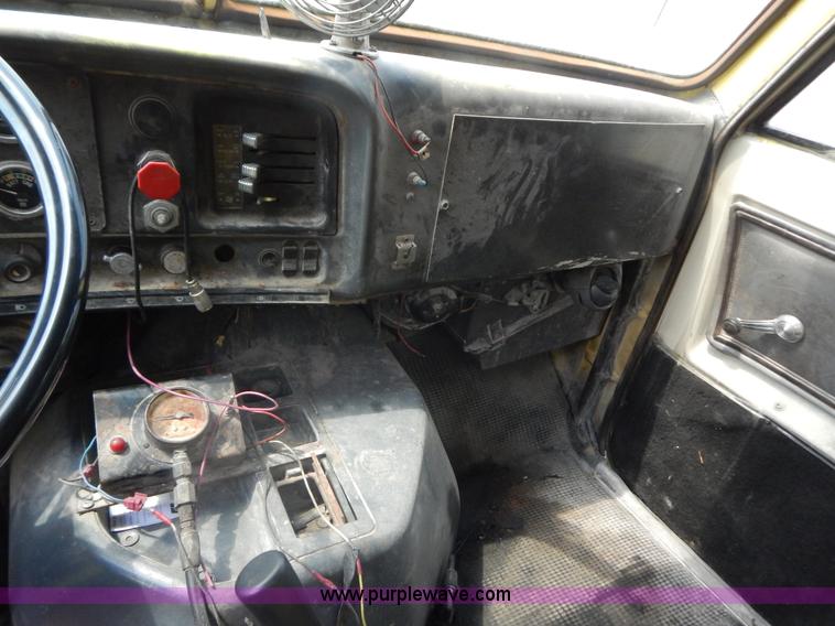 image for item G9479 1984 GMC Brigadier spreader truck