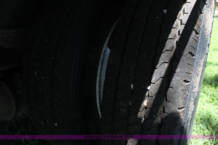 image for item H7419 1998 International 4700 low profile truck