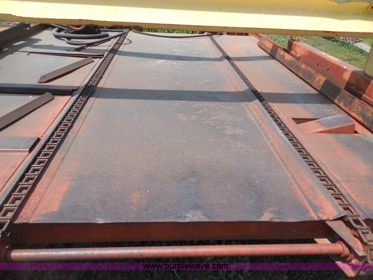 image for item H9992 Farm Hand E100-D eight bale accumulator