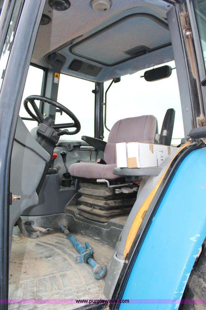 image for item G5234 1998 New Holland TS100 tractor