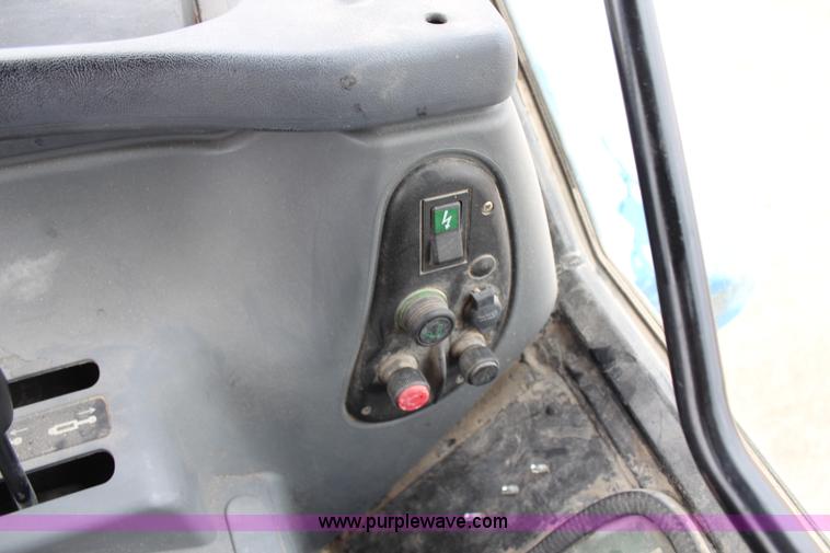 image for item G5234 1998 New Holland TS100 tractor