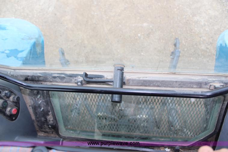 image for item G5234 1998 New Holland TS100 tractor