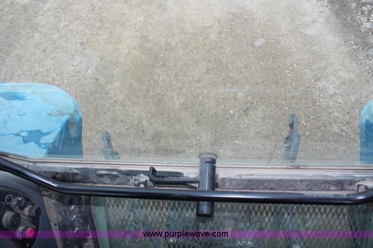 image for item G5234 1998 New Holland TS100 tractor