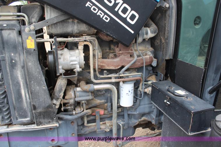 image for item G5234 1998 New Holland TS100 tractor