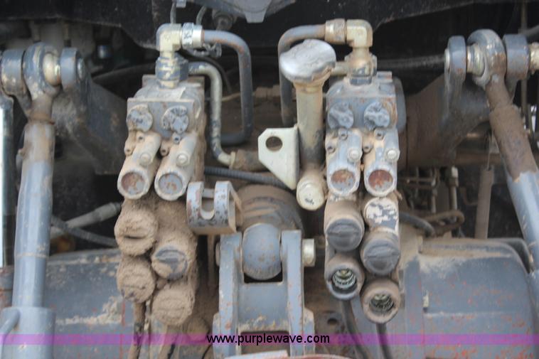 image for item G5234 1998 New Holland TS100 tractor