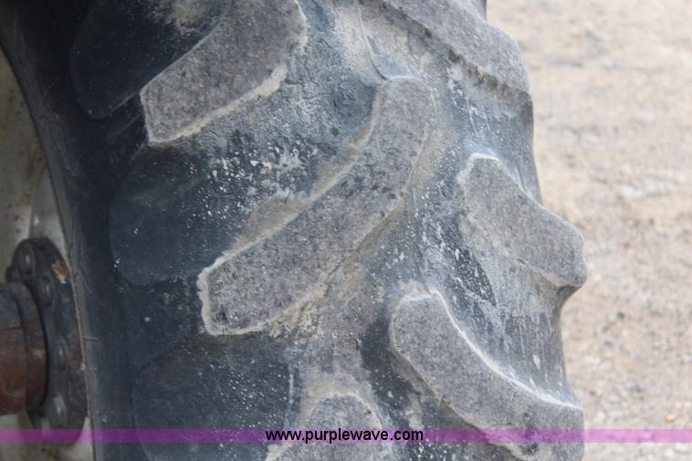 image for item G5234 1998 New Holland TS100 tractor