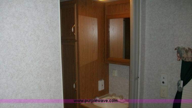 image for item C1233 1997 Fleetwood LY Spearmint camper