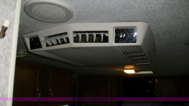 image for item C1233 1997 Fleetwood LY Spearmint camper