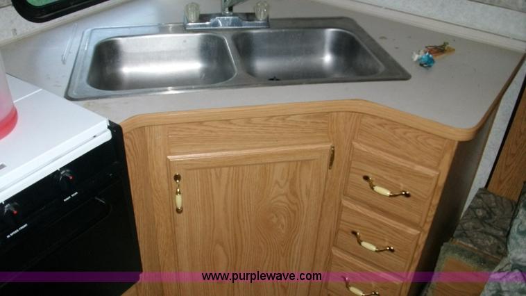 image for item C1233 1997 Fleetwood LY Spearmint camper