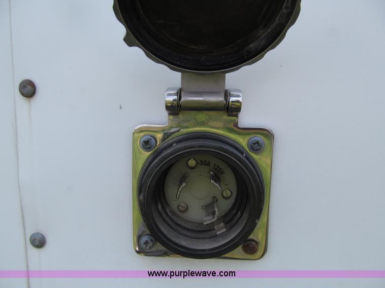 image for item D7434 2000 Pace American ConQuest tandem axle vending trailer