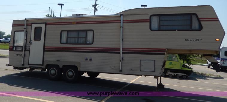 image for item I4470 1984 Nuwa Hitchhiker 28.5' fifth wheel camper