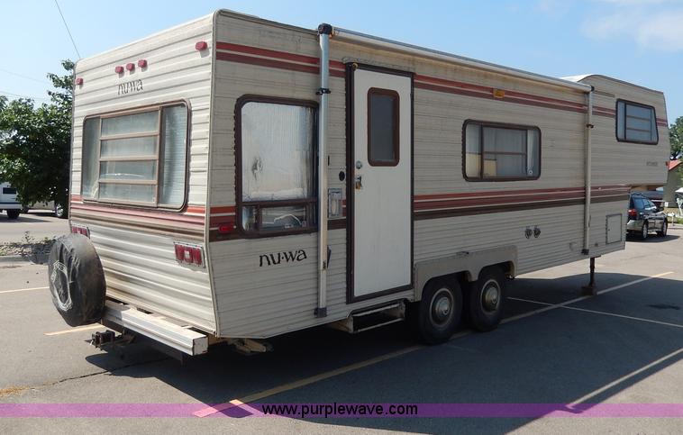 image for item I4470 1984 Nuwa Hitchhiker 28.5' fifth wheel camper