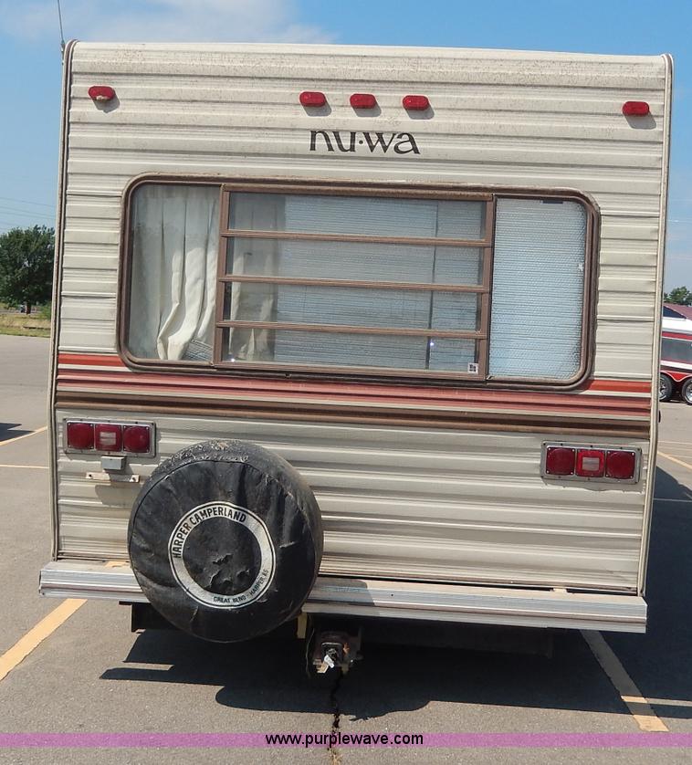 image for item I4470 1984 Nuwa Hitchhiker 28.5' fifth wheel camper