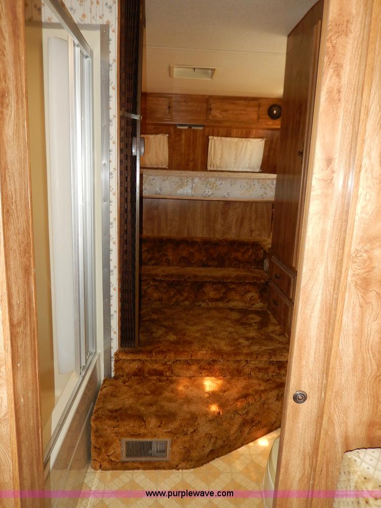 image for item I4470 1984 Nuwa Hitchhiker 28.5' fifth wheel camper