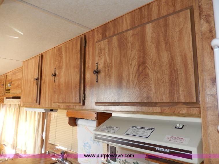 image for item I4470 1984 Nuwa Hitchhiker 28.5' fifth wheel camper