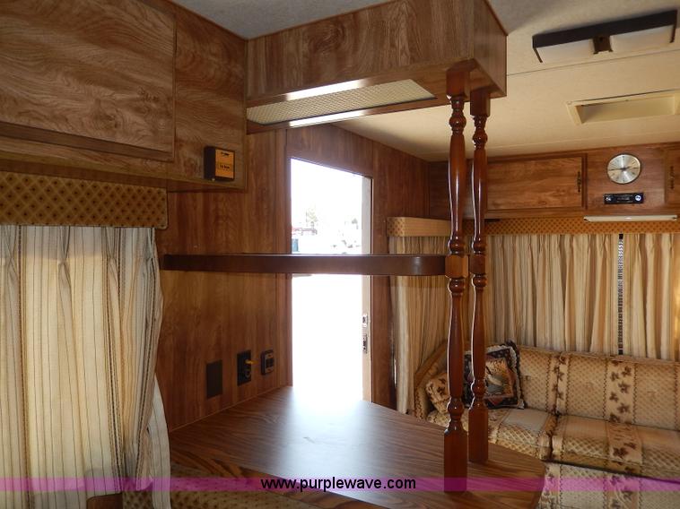 image for item I4470 1984 Nuwa Hitchhiker 28.5' fifth wheel camper