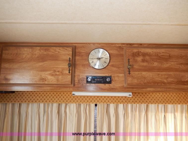 image for item I4470 1984 Nuwa Hitchhiker 28.5' fifth wheel camper