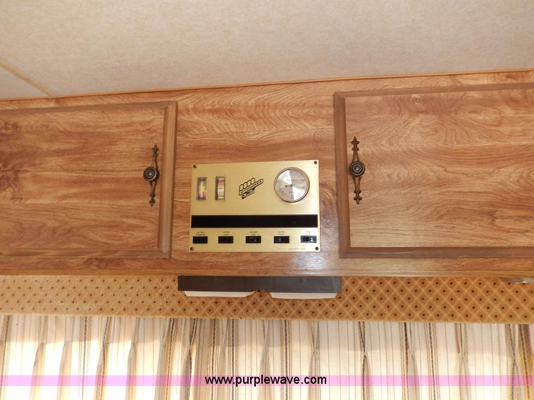 image for item I4470 1984 Nuwa Hitchhiker 28.5' fifth wheel camper