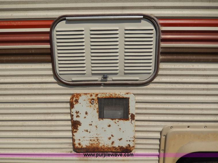 image for item I4470 1984 Nuwa Hitchhiker 28.5' fifth wheel camper