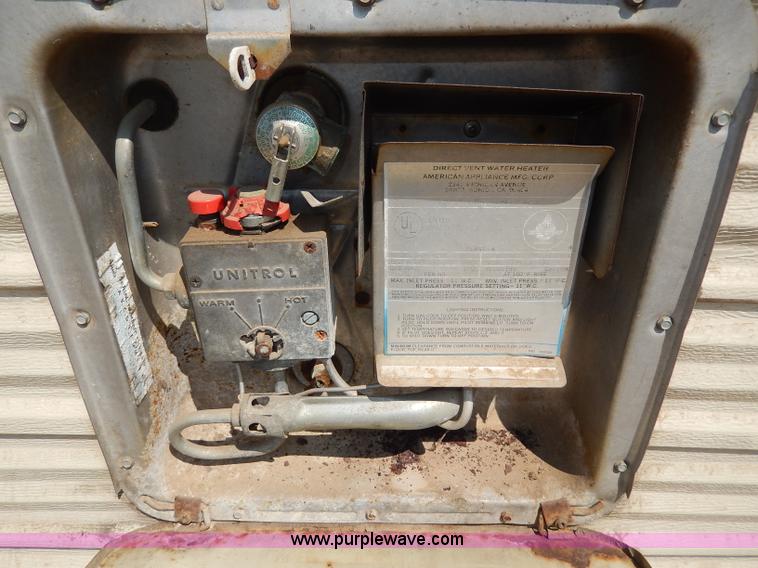 image for item I4470 1984 Nuwa Hitchhiker 28.5' fifth wheel camper