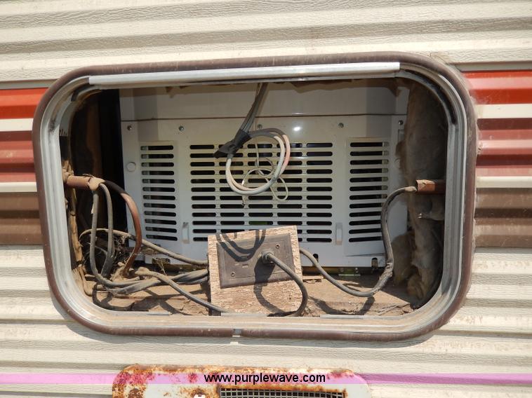 image for item I4470 1984 Nuwa Hitchhiker 28.5' fifth wheel camper