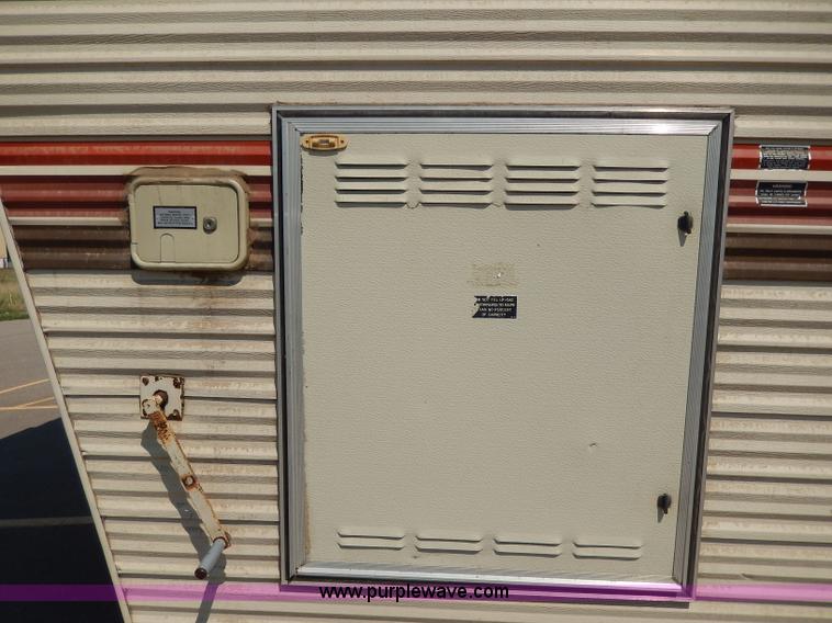 image for item I4470 1984 Nuwa Hitchhiker 28.5' fifth wheel camper