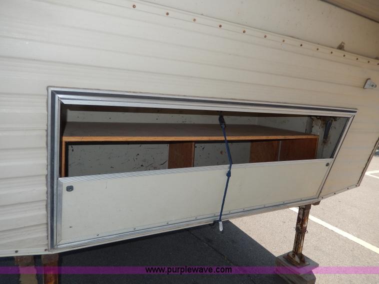 image for item I4470 1984 Nuwa Hitchhiker 28.5' fifth wheel camper