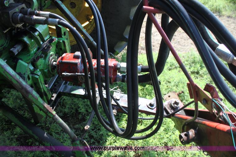 image for item G4029 1995 MacDon 5000 HydroSwing swather