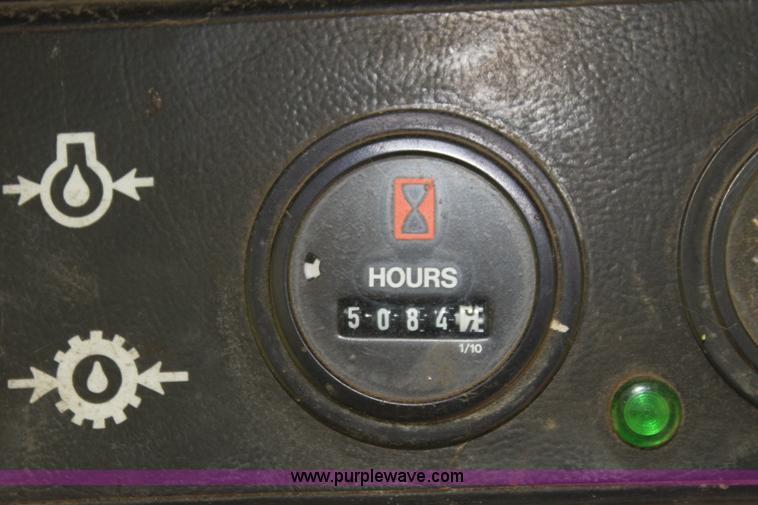 image for item G4030 1990 MacDon 7000 self-propelled swather