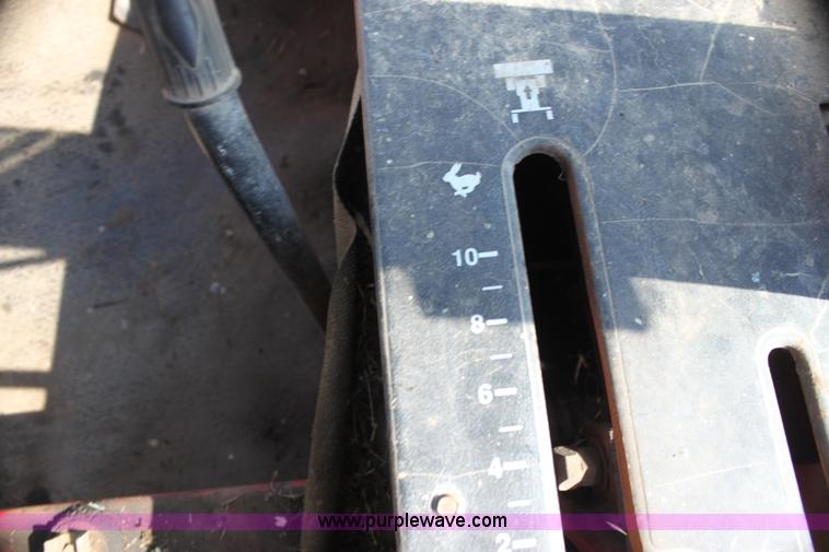 image for item G4030 1990 MacDon 7000 self-propelled swather