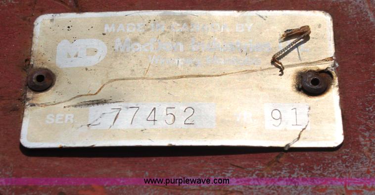 image for item G4030 1990 MacDon 7000 self-propelled swather