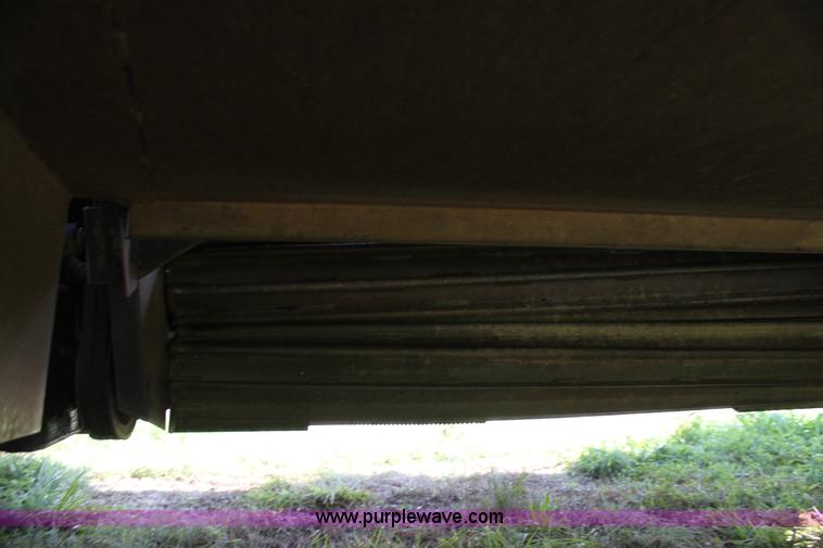 image for item G4030 1990 MacDon 7000 self-propelled swather