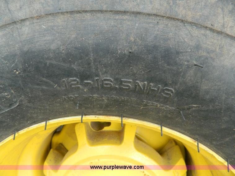 image for item G7542 2006 John Deere 2320 MFWD tractor