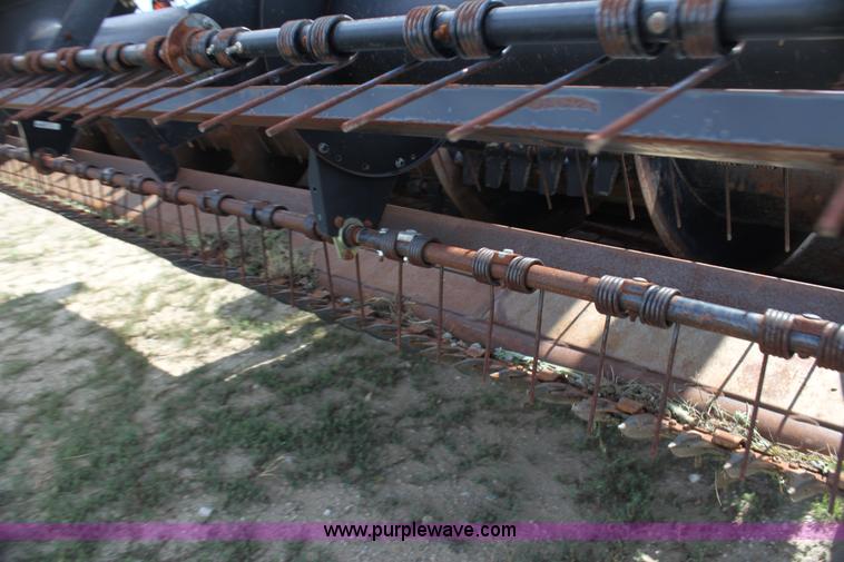 image for item H7378 2000 Mac Don 9350 Turbo swather