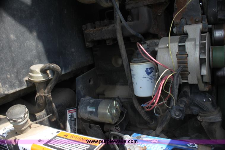 image for item H7378 2000 Mac Don 9350 Turbo swather