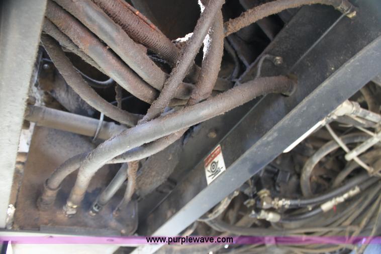 image for item H7378 2000 Mac Don 9350 Turbo swather